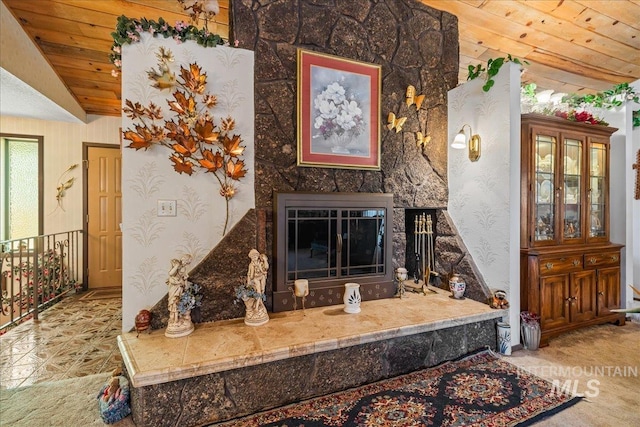 2503 Lyle Ct, Nampa, ID 83651 - living room with lofted ceiling, a tiled fireplace, and wallpapered walls
