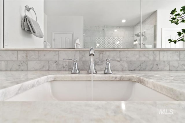 5446 E Branchwood Ct, Boise, ID 83716 - bathroom view of a tile shower and tasteful backsplash