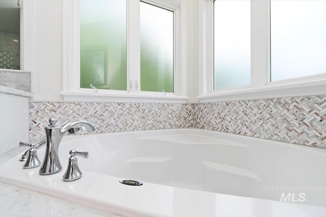 5446 E Branchwood Ct, Boise, ID 83716 - full bath with tasteful backsplash and a bath