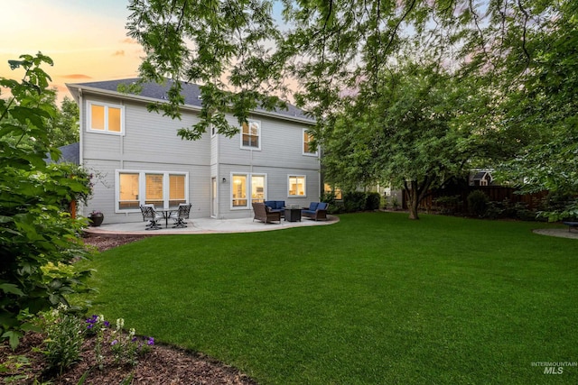 5446 E Branchwood Ct, Boise, ID 83716 - back of property at dusk with a patio area and outdoor lounge area