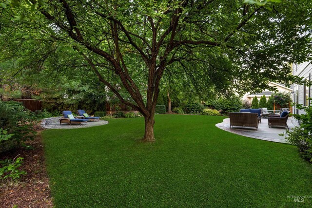 5446 E Branchwood Ct, Boise, ID 83716 - view of yard with an outdoor living space and a patio