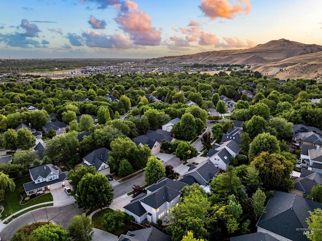 5446 E Branchwood Ct, Boise, ID 83716 - aerial view at dusk of a residential view and a mountain view