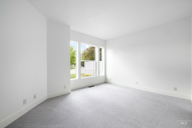 2928 W Los Flores Dr, Meridian, ID 83646 - carpeted spare room with baseboards