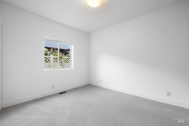 2928 W Los Flores Dr, Meridian, ID 83646 - carpeted spare room with baseboards