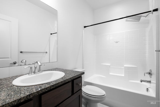 2928 W Los Flores Dr, Meridian, ID 83646 - bathroom featuring toilet, vanity, and bathing tub / shower combination