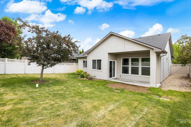 2928 W Los Flores Dr, Meridian, ID 83646 - back of house with a patio area and a shingled roof