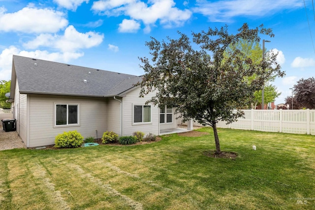 2928 W Los Flores Dr, Meridian, ID 83646 - back of property with roof with shingles