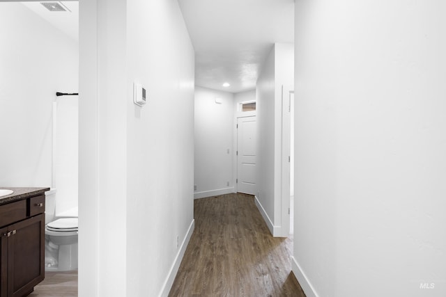 2928 W Los Flores Dr, Meridian, ID 83646 - corridor featuring wood finished floors and baseboards