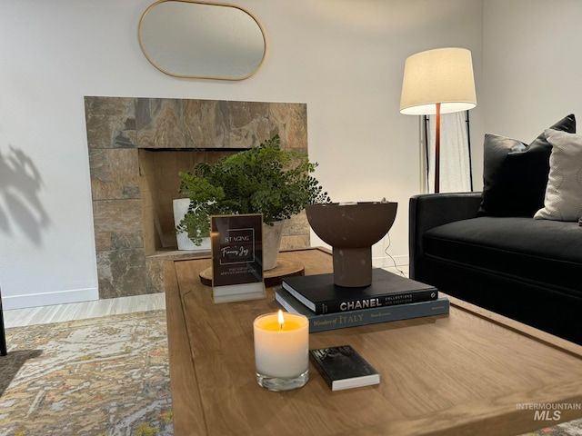 living room featuring hardwood / wood-style floors and a fireplace