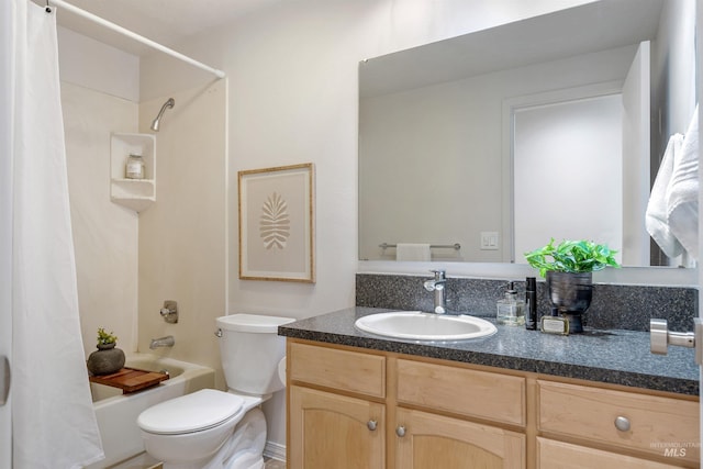 full bathroom featuring vanity, toilet, and shower / bathtub combination with curtain