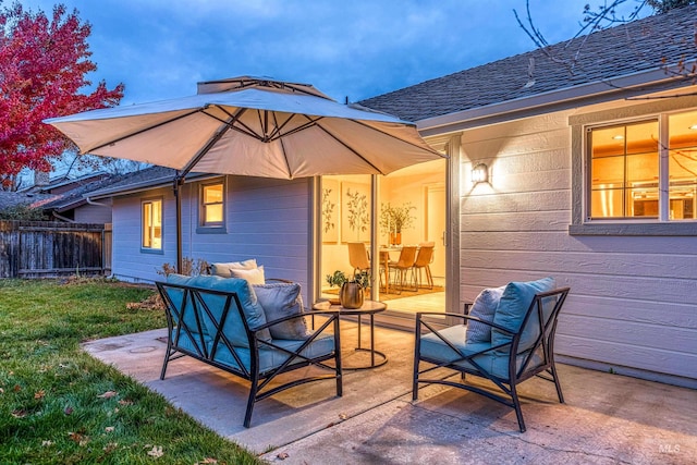 exterior space featuring a patio area and outdoor lounge area