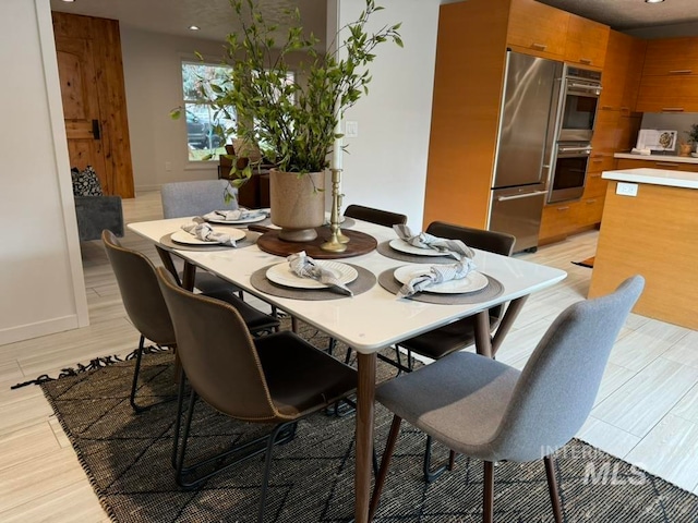 dining room featuring light wood-type flooring