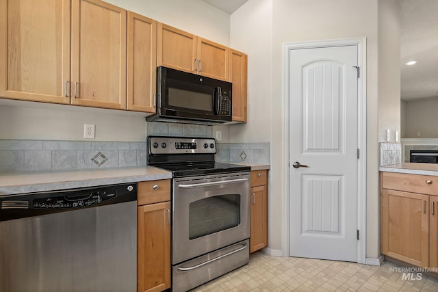 kitchen featuring stainless steel appliances, light countertops, backsplash, light brown cabinetry, and recessed lighting