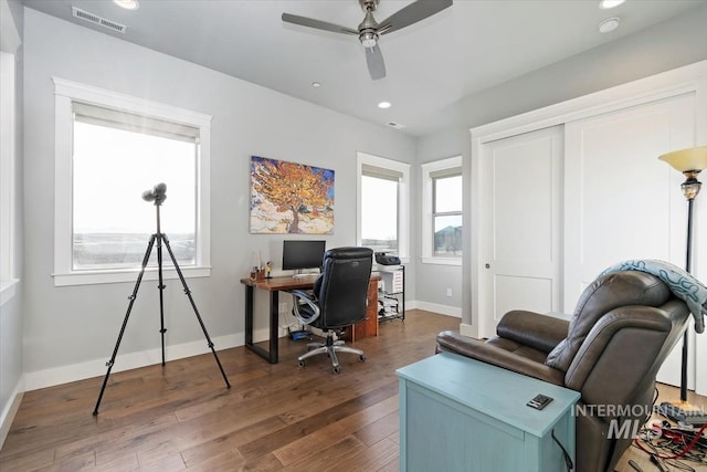 office space with visible vents, recessed lighting, baseboards, and hardwood / wood-style flooring