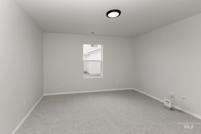 1078 Quartzite Ave, Middleton, ID 83644 - spare room featuring baseboards, vaulted ceiling, wood finished floors, and ceiling fan with notable chandelier