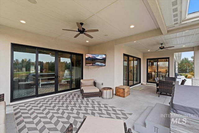 view of patio with ceiling fan