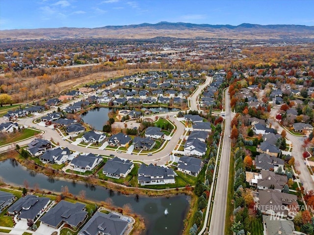 aerial view with a water and mountain view