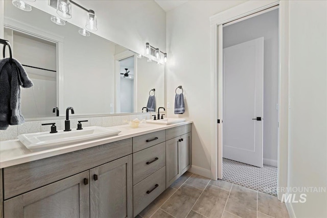 20150 Silver Spur Dr, Wilder, ID 83676 - bathroom with double vanity and baseboards