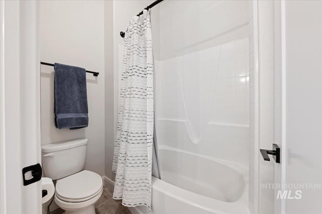 20150 Silver Spur Dr, Wilder, ID 83676 - bathroom featuring shower / bath combo with shower curtain and toilet