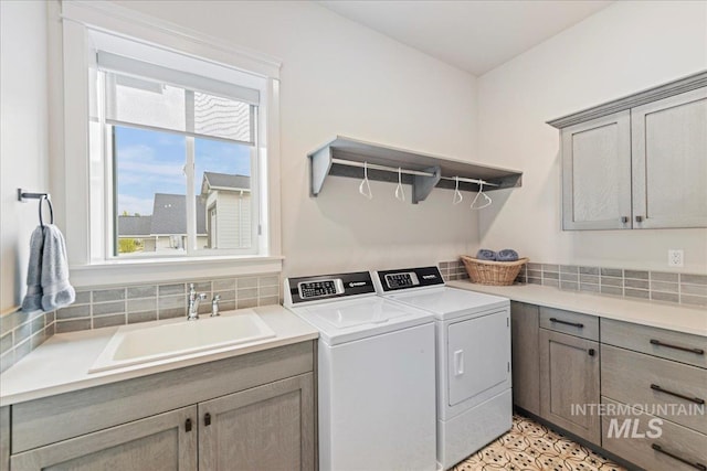 20150 Silver Spur Dr, Wilder, ID 83676 - laundry room with cabinet space and washer and dryer