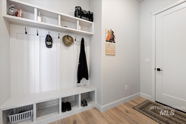 20150 Silver Spur Dr, Wilder, ID 83676 - mudroom featuring wood finished floors and baseboards