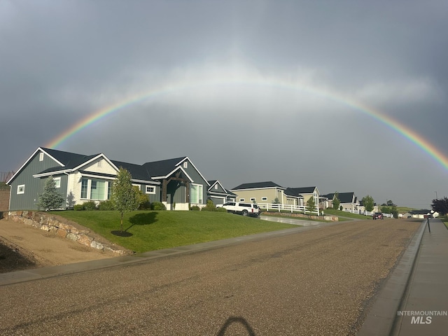 20150 Silver Spur Dr, Wilder, ID 83676 - view of front of house with a front lawn and a residential view