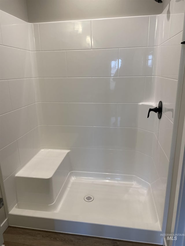 full bathroom featuring walk in shower