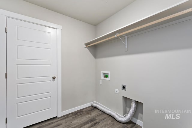 washroom featuring washer hookup, dark hardwood / wood-style floors, and hookup for an electric dryer