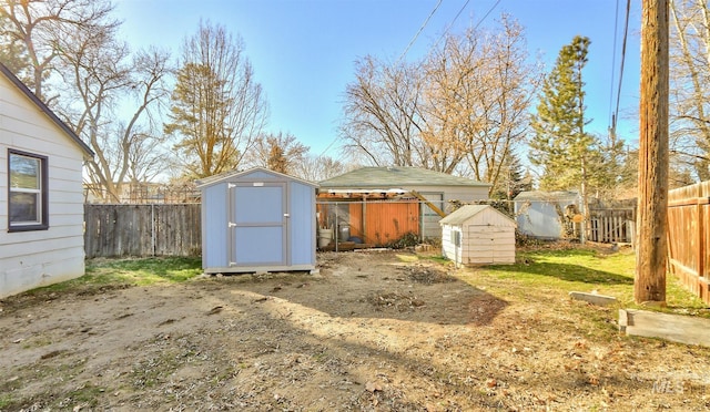 view of shed with a fenced backyard