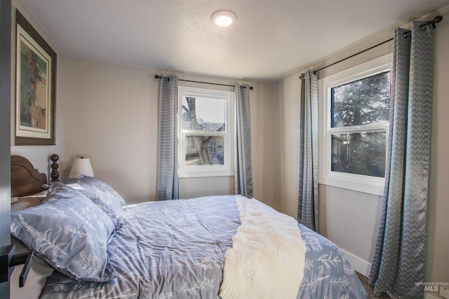 bedroom with baseboards