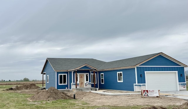 view of front of home with an attached garage and driveway