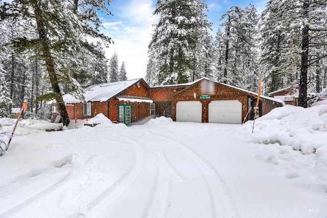 view of front of property featuring a garage