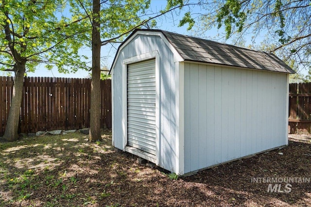 view of shed featuring a fenced backyard