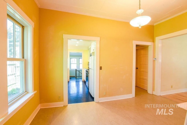 512 N Lincoln St, Moscow, ID 83843 - unfurnished room featuring baseboards and ornamental molding