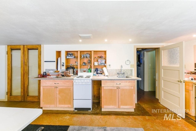 512 N Lincoln St, Moscow, ID 83843 - kitchen featuring light countertops, recessed lighting, a sink, and white range with electric stovetop