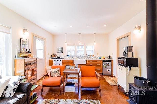 512 N Lincoln St, Moscow, ID 83843 - dining area featuring concrete flooring and recessed lighting
