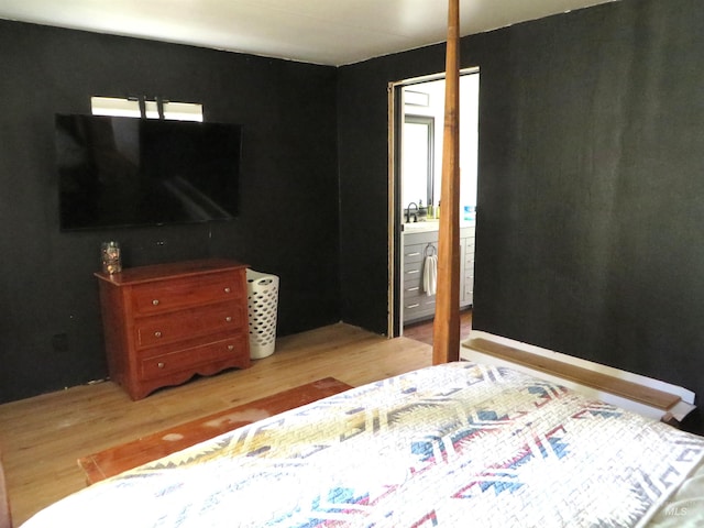 937 Indianhead Rd, Weiser, ID 83672 - bedroom with light wood-style flooring and a sink