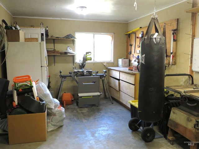 937 Indianhead Rd, Weiser, ID 83672 - kitchen with freestanding refrigerator, concrete flooring, crown molding, and open shelves