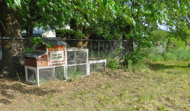 937 Indianhead Rd, Weiser, ID 83672 - view of yard featuring exterior structure, an outbuilding, and fence
