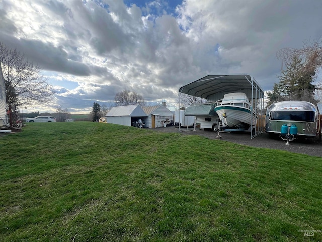 view of yard featuring a carport