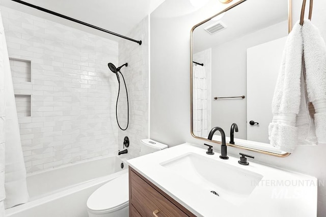 1866 S Goldking Way, Boise, ID 83709 - bathroom featuring toilet, vanity, and shower / tub combo with curtain