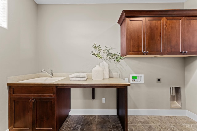 washroom featuring hookup for a washing machine, electric dryer hookup, cabinets, and sink