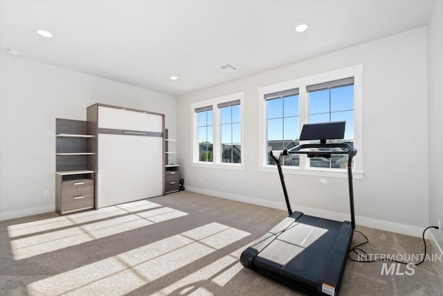exercise area with carpet, baseboards, and recessed lighting