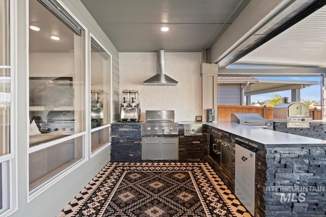 view of patio featuring area for grilling and a grill