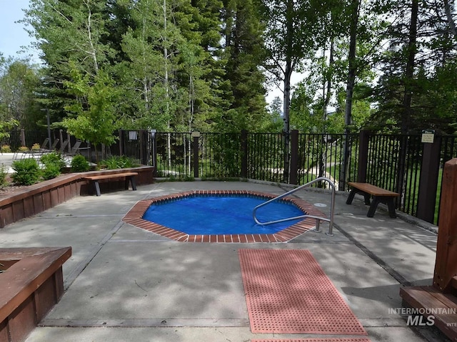 1319 Hearthstone Ct Unit 3-A, Mccall, ID 83638 - view of pool with a swimming pool and a patio