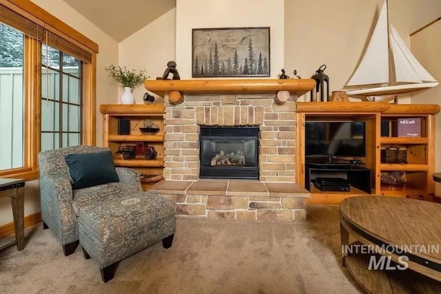 1319 Hearthstone Ct Unit 3-A, Mccall, ID 83638 - living area featuring carpet flooring, vaulted ceiling, and a fireplace