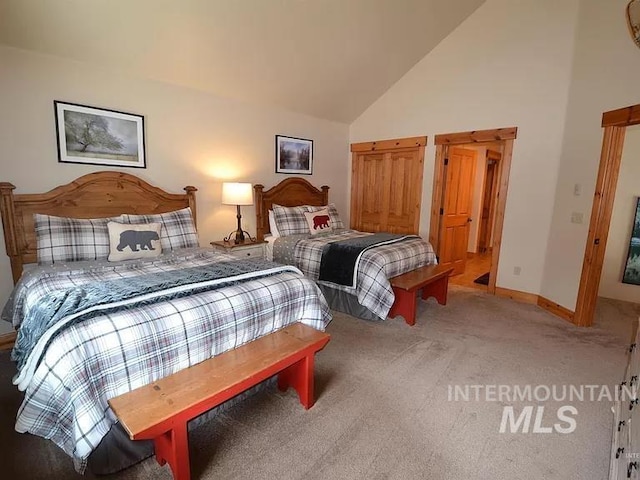 1319 Hearthstone Ct Unit 3-A, Mccall, ID 83638 - carpeted bedroom featuring high vaulted ceiling and baseboards