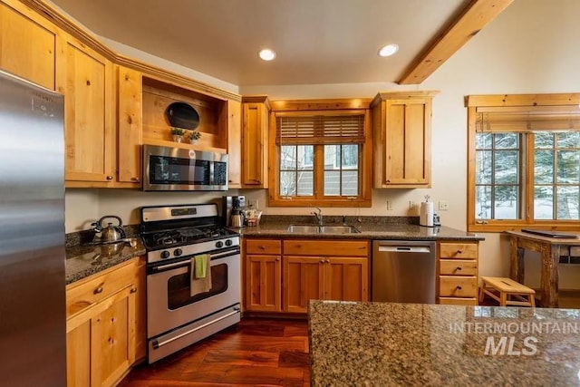 1319 Hearthstone Ct Unit 3-A, Mccall, ID 83638 - kitchen with appliances with stainless steel finishes, a sink, dark wood-style floors, dark stone countertops, and recessed lighting