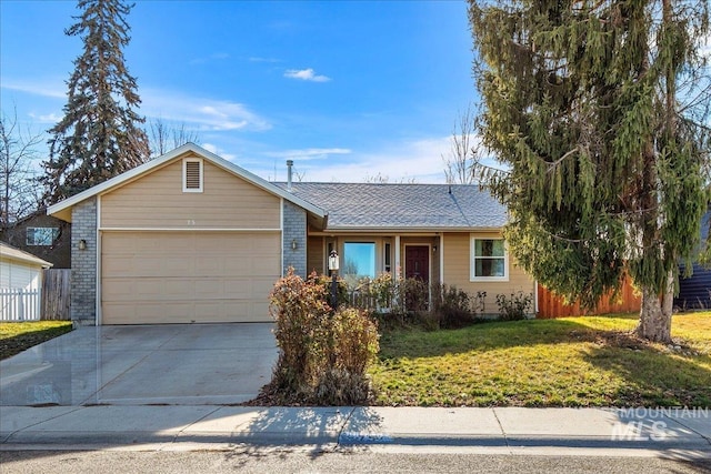 single story home featuring a front lawn and a garage