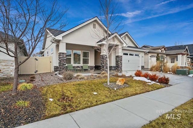 view of front facade featuring a garage and a front lawn